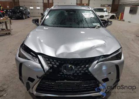 2025 Lexus Ux 300H Premium z USA, uszkodzony, nr VIN JTHUCJDH0S2000729